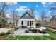 Charming backyard with a stone patio perfect for entertaining and enjoying outdoor living at 450 W Ash St, Zionsville, IN 46077