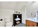 Charming bathroom with patterned tile, glass enclosed shower, and stylish storage at 450 W Ash St, Zionsville, IN 46077