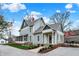 Beautiful two-story home with a well-manicured lawn and inviting front entrance at 450 W Ash St, Zionsville, IN 46077