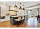 Elegant kitchen featuring a large island with seating and stainless steel appliances at 450 W Ash St, Zionsville, IN 46077