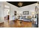 Inviting living room with hardwood floors, fireplace, and natural light at 450 W Ash St, Zionsville, IN 46077