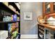 Organized pantry featuring custom shelving and stylish wallpaper at 450 W Ash St, Zionsville, IN 46077