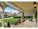 Charming covered porch showcasing intricate detailing and a relaxing rocking chair at 450 W Ash St, Zionsville, IN 46077