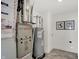Basement features a Bryant furnace and water heater for efficient home systems at 4571 Laughter Ln, Indianapolis, IN 46235