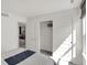 Bright bedroom features a closet with sliding doors and an adjoining room at 4571 Laughter Ln, Indianapolis, IN 46235