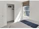 Charming bedroom with a window and closet with sliding doors offering ample storage at 4571 Laughter Ln, Indianapolis, IN 46235