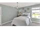 Light-filled bedroom features decor, creating a cozy and inviting space at 4571 Laughter Ln, Indianapolis, IN 46235