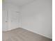 Bedroom with carpet, light-colored walls, and a closet with sliding doors at 5138 Modernist Blvd, Indianapolis, IN 46237