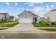 Beautiful single-Gathering home with a well-maintained lawn and long driveway at 5138 Modernist Blvd, Indianapolis, IN 46237
