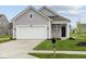 Well-kept home with a manicured lawn and lovely curb appeal at 5138 Modernist Blvd, Indianapolis, IN 46237