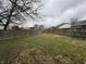 Fenced backyard with a well-maintained lawn at 5730 Pemberly Dr, Indianapolis, IN 46221