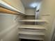 Spacious closet with ample shelving for optimal storage at 5730 Pemberly Dr, Indianapolis, IN 46221