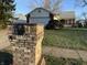 Charming home featuring brick mailbox, walkway and well-manicured front lawn at 5730 Pemberly Dr, Indianapolis, IN 46221