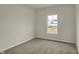 Bedroom with neutral carpet and window view at 5777 Greenbrier Ct, Brownsburg, IN 46112