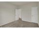 Bedroom with neutral carpet and two doors at 5777 Greenbrier Ct, Brownsburg, IN 46112