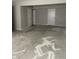 Empty basement room, featuring plain concrete floor and white painted walls at 6009 Tammin Dr, Indianapolis, IN 46254
