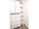 Walk-in closet includes built-in shelving, drawers, and cabinets at 615 E Morris St, Indianapolis, IN 46203