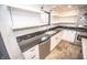 Kitchen features stainless steel appliances, granite counters, and ample natural light at 615 E Morris St, Indianapolis, IN 46203