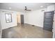 A spacious main bedroom offers plentiful natural light and wood floors at 615 E Morris St, Indianapolis, IN 46203
