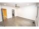 Large main bedroom boasts wood floors and an ensuite bath at 615 E Morris St, Indianapolis, IN 46203