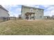 Backyard featuring a wooden pergola with swing at 6180 N Rosewood Dr, McCordsville, IN 46055