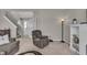 Inviting living area with comfortable seating, neutral tones, and an open layout at 6180 N Rosewood Dr, McCordsville, IN 46055