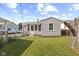 A well-maintained home with a private, grassy backyard perfect for outdoor activities at 633 Fletcher Ln, Beech Grove, IN 46107