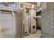 Basement mechanicals including water heater and ductwork at 633 Fletcher Ln, Beech Grove, IN 46107