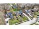 An aerial view showcases a home with a well-manicured lawn in a peaceful residential neighborhood at 6545 Briarwood Pl, Zionsville, IN 46077