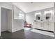 Modern bathroom featuring dual sinks, white cabinetry, and tiled walk-in shower at 6545 Briarwood Pl, Zionsville, IN 46077