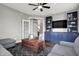 Cozy living room showcases built-in shelving, comfortable seating, and a decorative wood chest at 6545 Briarwood Pl, Zionsville, IN 46077