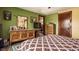 Cozy bedroom features hardwood floors, and ample natural light to create a serene and relaxing atmosphere at 741 Dequincy St, Indianapolis, IN 46201