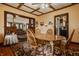 Warm dining room with a wood table and decorative rug with a view to the living room at 741 Dequincy St, Indianapolis, IN 46201