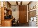 Traditional home office featuring built-in shelving, a work desk, and neutral decor for a productive workspace at 741 Dequincy St, Indianapolis, IN 46201