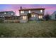 A well-maintained backyard with a wooden deck is perfect for outdoor entertaining and relaxation at 7531 Bancaster Dr, Indianapolis, IN 46268