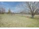 Expansive lawn area and view of lush greenery, creating a serene environment at 7531 Bancaster Dr, Indianapolis, IN 46268