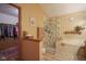 Spacious bathroom features a soaking tub, walk-in shower, and access to a large walk-in closet at 7531 Bancaster Dr, Indianapolis, IN 46268