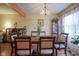 Formal dining room featuring wood table, chairs, and decorative china cabinet for elegant Gathering meals at 7531 Bancaster Dr, Indianapolis, IN 46268