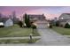 Charming two-story home with attached two-car garage and well-manicured landscaping at 7531 Bancaster Dr, Indianapolis, IN 46268
