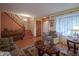 Spacious living area with hardwood floors, stairs to the second floor and a window at 7531 Bancaster Dr, Indianapolis, IN 46268