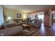 Comfortable living room featuring hardwood floors and ample seating, perfect for entertaining at 7531 Bancaster Dr, Indianapolis, IN 46268