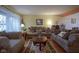Comfortable living room featuring hardwood floors and ample seating, perfect for entertaining at 7531 Bancaster Dr, Indianapolis, IN 46268