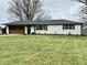 Charming single-story home featuring a well-manicured lawn and inviting exterior accents at 7874 E County Road 200 N, Avon, IN 46123