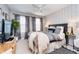 Nicely styled bedroom with a ceiling fan and cozy furnishings at 8253 Belcrest Ct, Indianapolis, IN 46256