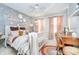 Cozy bedroom features a decorative headboard, accent wall and writing desk at 8253 Belcrest Ct, Indianapolis, IN 46256