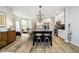 Bright kitchen island, with barstools, stainless appliances, granite, and an open layout to the living space at 8253 Belcrest Ct, Indianapolis, IN 46256