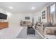 Spacious living room with comfortable sofas, a modern coffee table, and neutral decor creating a relaxing atmosphere at 8253 Belcrest Ct, Indianapolis, IN 46256