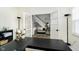 Office featuring french doors, a view into the foyer, and a black desk at 8253 Belcrest Ct, Indianapolis, IN 46256