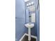 The half bath in this home features a blue paint, and pedestal sink at 8551 Belle Union Ct, Camby, IN 46113