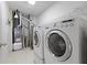 Laundry Room with Washer and Dryer, furnace and wire shelving at 8551 Belle Union Ct, Camby, IN 46113